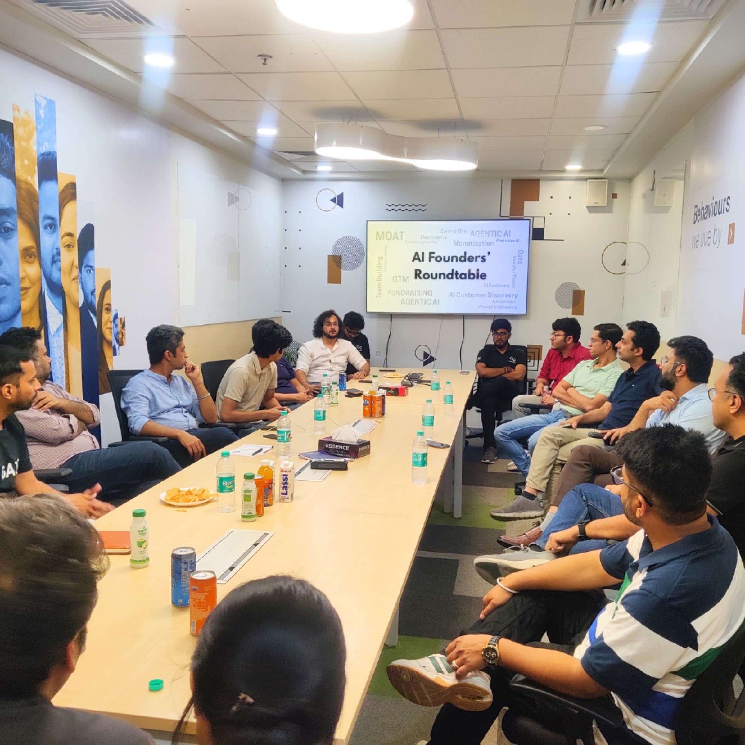 Founders around a table at a TrueAlpha roundtable