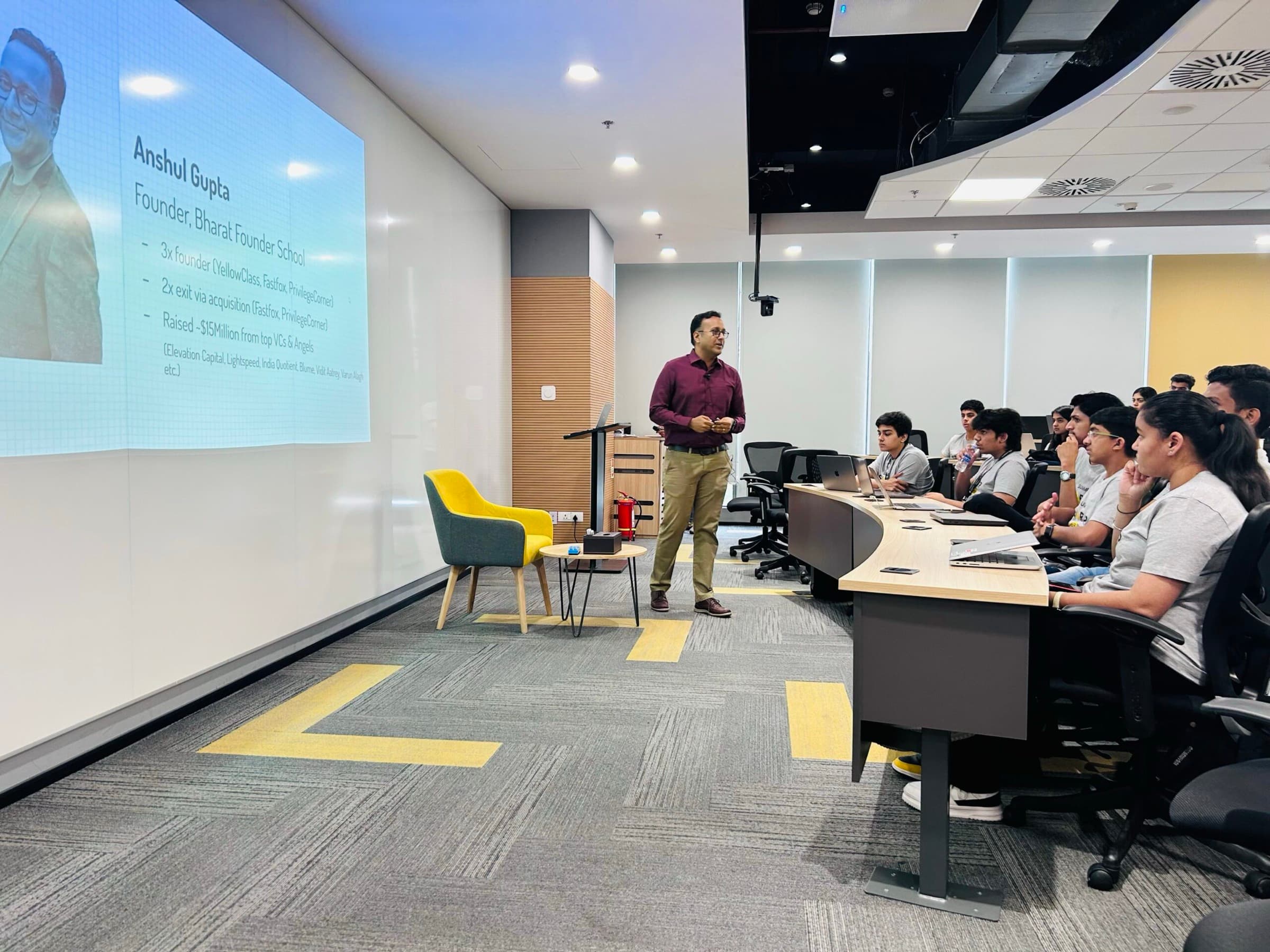 Anshul Gupta presenting to a room of founders